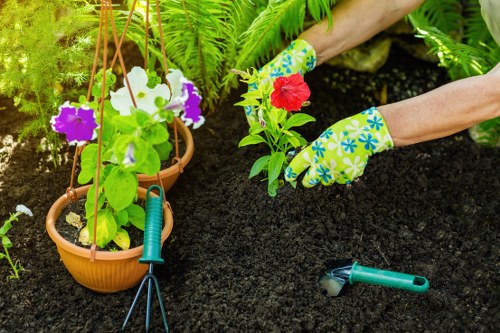 Company team preparing tools before starting garden maintenance